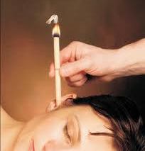 lady having hopi ear candle for asthma, hay fever in Cardiff
