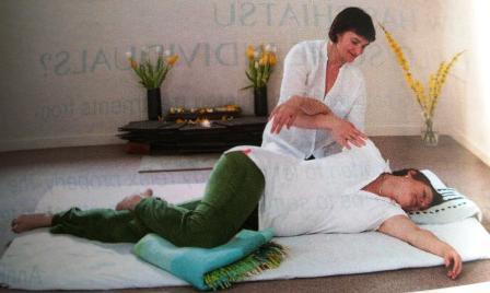 lady having Shiatsu on floormat for anxiety treatment in Cardiff