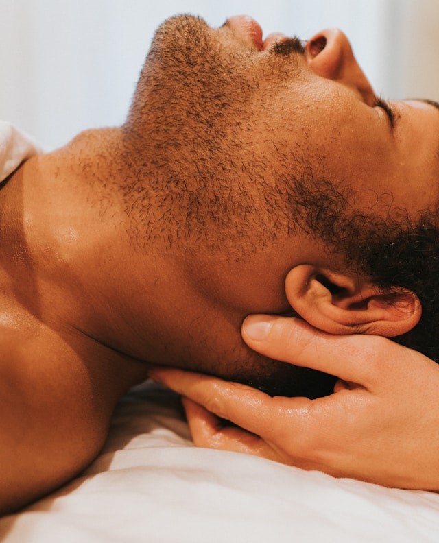 Indian head massage Photo by Elle Cartier on Unsplash