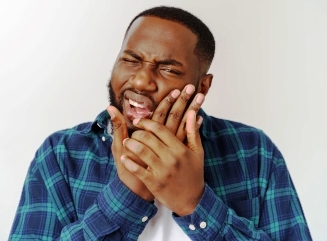 man with TMJ syndrome tooth pain cardiff