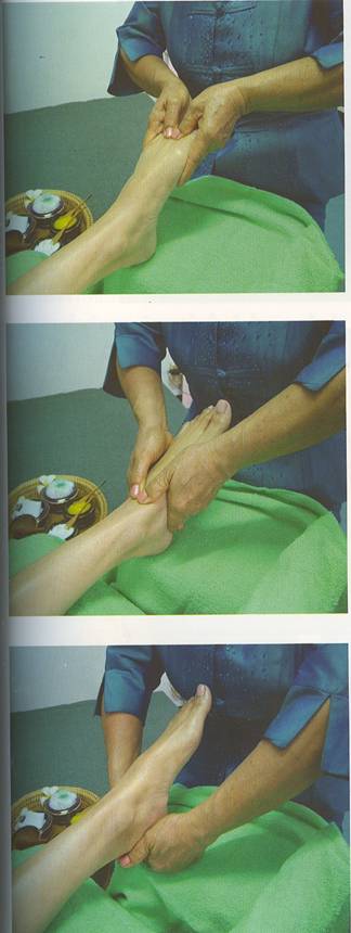 Cardiff Reflexology photo - foot reflexology with Thai style stick using herbs