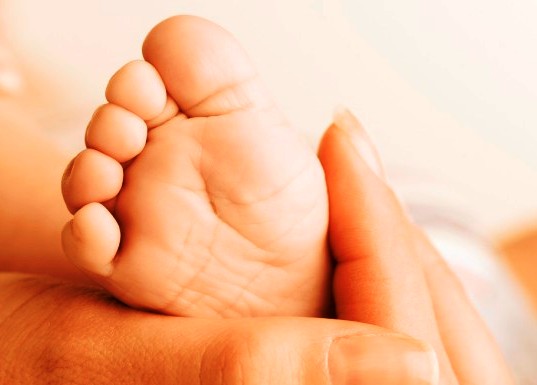 reflexology on infant child in Cardiff